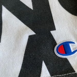 Men’s Champion Heritage Tee, All Over Logo (L)